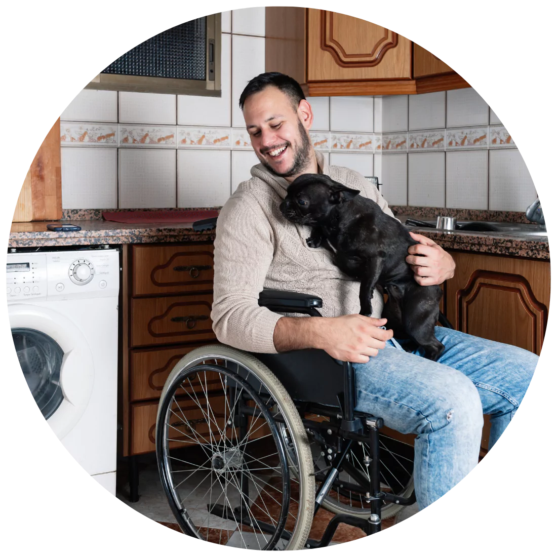 Disabled man smiling and sitting on the wheelchair while holding his pet dog